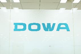 DOWA Holdings sign and logo